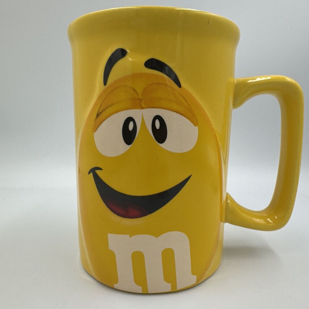 M&M's Yellow Mug 3D Character Face Raised Letters 2012 Mars Ceramic Coffee‎ Cup